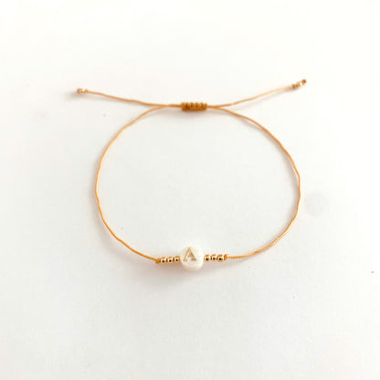 Perle alphabet en nacre